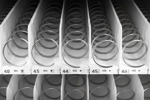 Mechanical vending machine product coils
